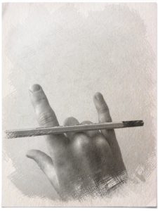 Hand with spread pointing and small finger and pen